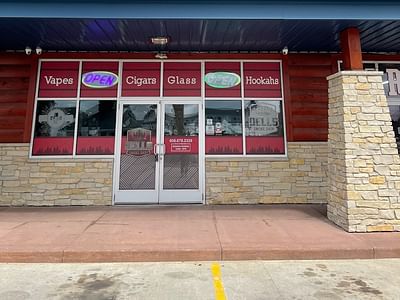 Dells Smoke Shop Inc