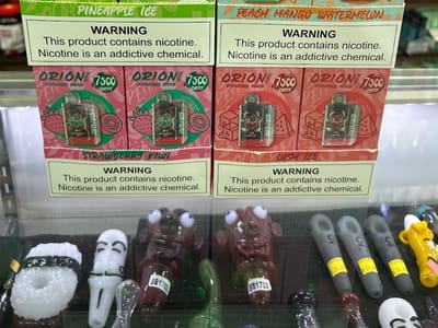 Exotic Smoke & Vape Shop - (18+Delta CBD Dispensary)