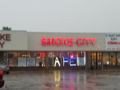 SMOKE CITY VAPES CIGARS TOBACCO GLASS CBD OIL SUPER STORE