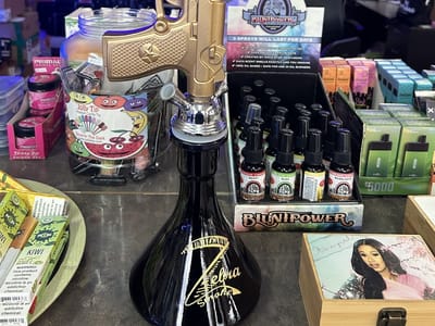 Supreme Dungeon Graphic CBD and Hookah Shop