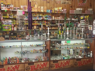 TOBACCO ZONE VAPES GLASS CBD HOOKAHS KRATOM SMOKE SHOP