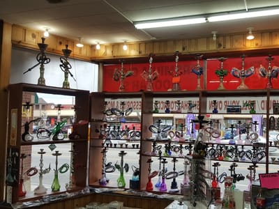 TOBACCO ZONE VAPES GLASS CBD HOOKAHS KRATOM SMOKE SHOP
